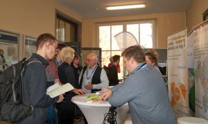 Exhibition stand with people in conversation