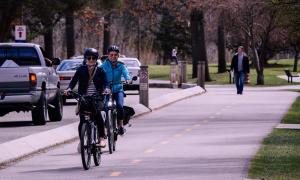 People on bicycles on a street