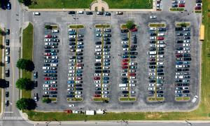 Aerial view of car park with many cars