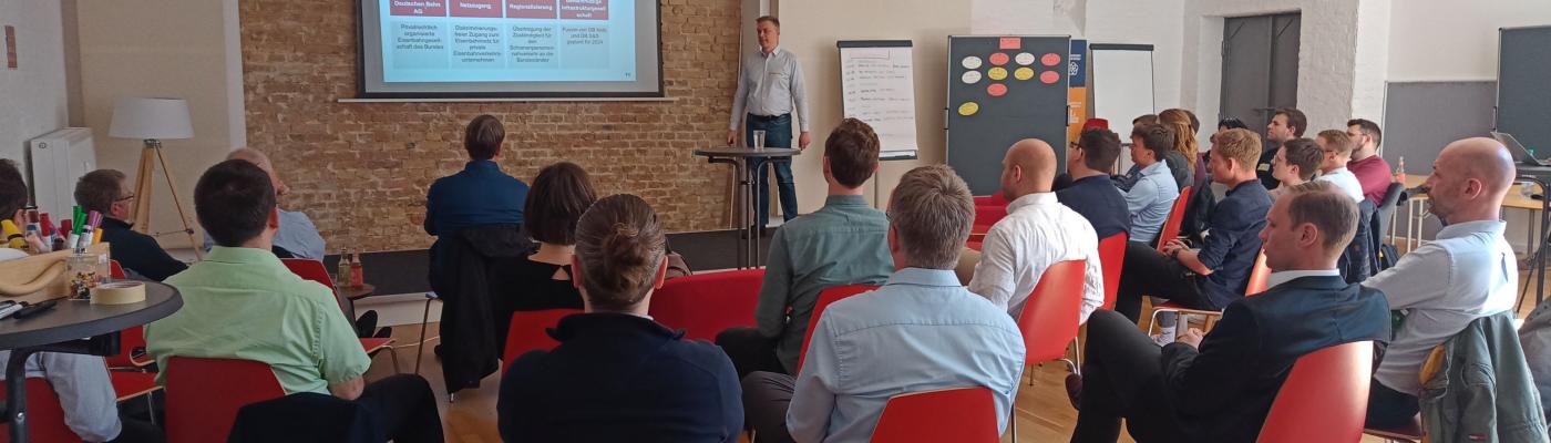 A seminar room with a group of people