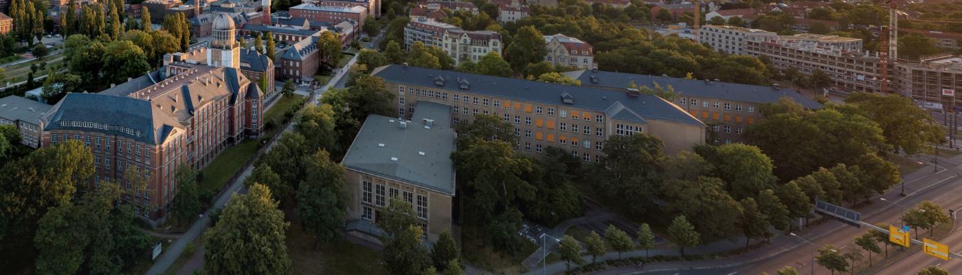 The photo shows an aerial view of some of the TU Dresden buildings.