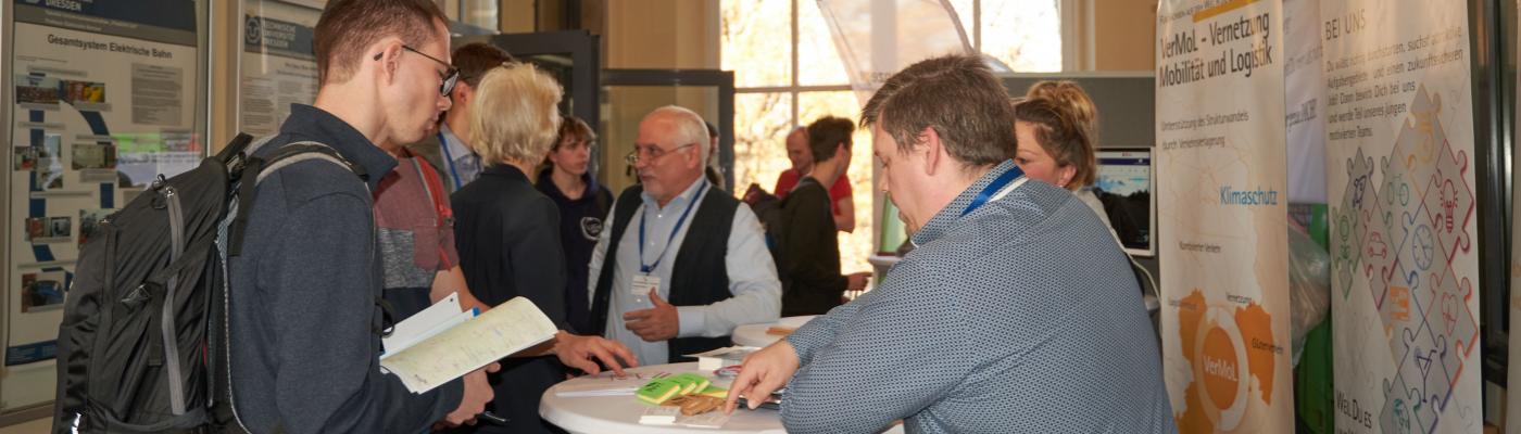 Exhibition stand with people in conversation