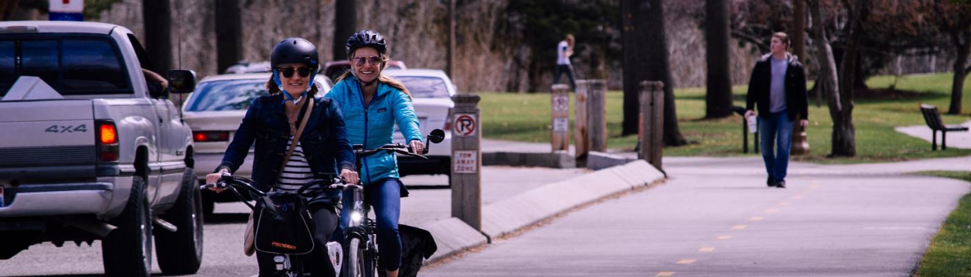 People on bicycles on a street