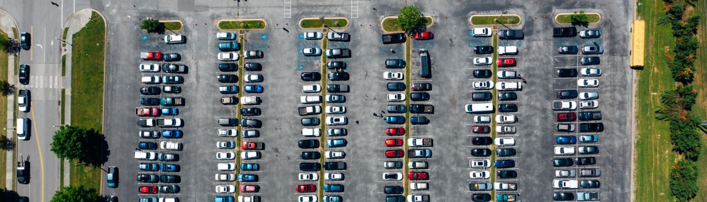 Aerial view of car park with many cars